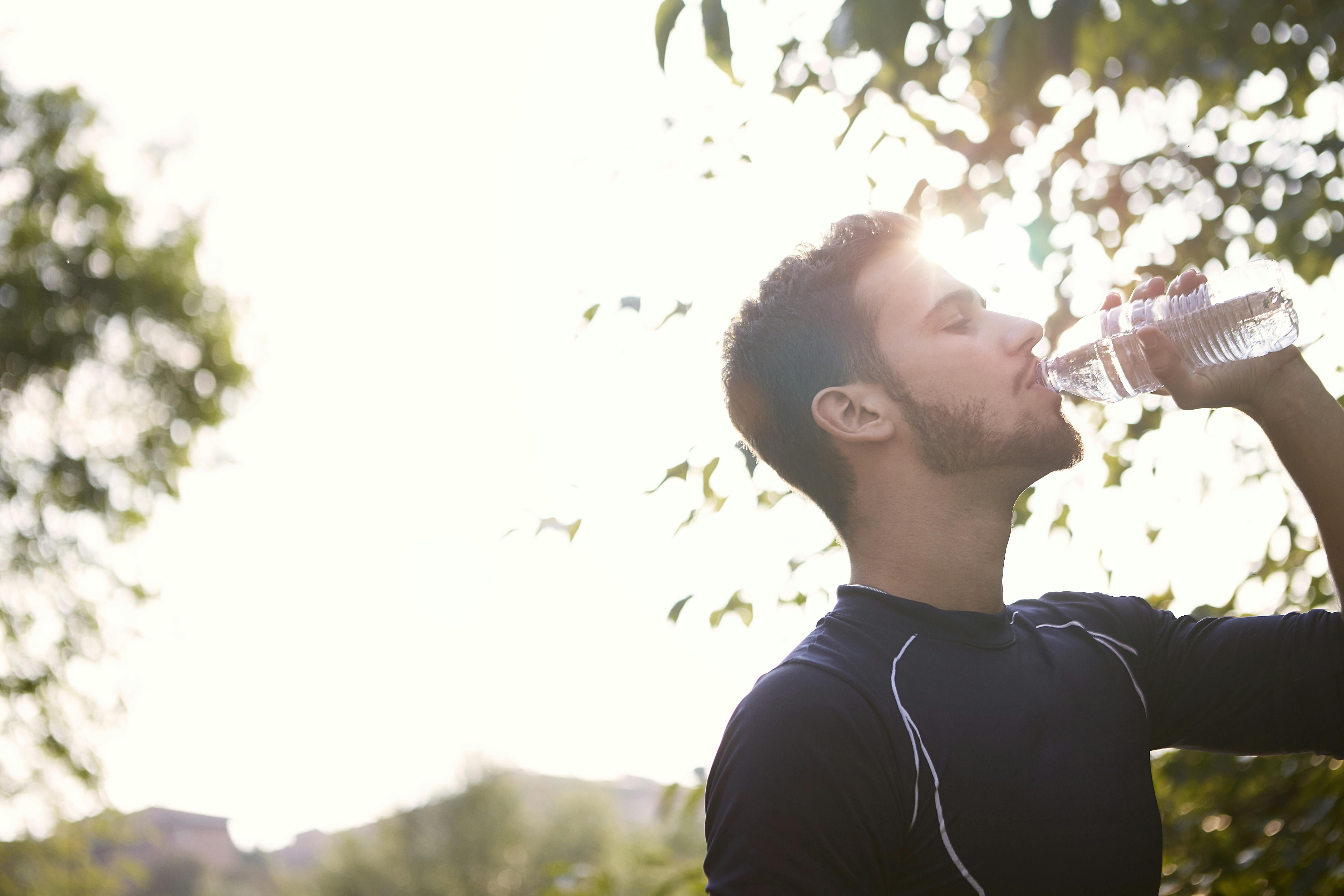 A man drinking water